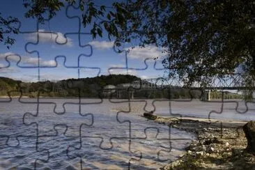 Big Muddy shoreline and highway bridge jigsaw puzzle