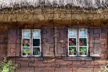 Old wooden house with window shutters jigsaw puzzle