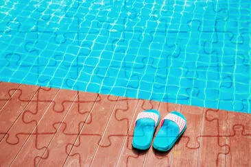 Slippers near the swimming pool jigsaw puzzle