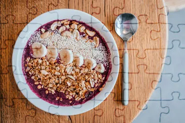 Beautiful blueberry banana smoothie bowl with a sp jigsaw puzzle