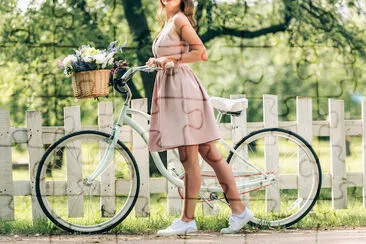 Woman Riding a Retro Bycicle jigsaw puzzle