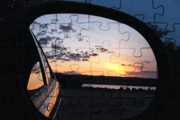 Sunset in the rearview mirror