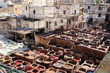 Vats of fabric dye at factory in Morocco