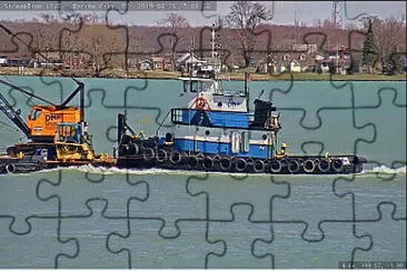 tug  "Kimberly Anne " and a crane barge