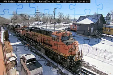 BNSF-6814 passing thru Parkville,MO/USA in the SNOW