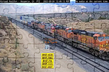 BNSF-4038,7883,756,1123,4807, in the afternoon sun crossing the desert